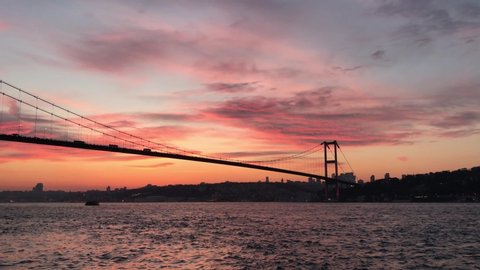 Sunset at July 15 Martyrs Bridge (Bosphorus Bridge) with azan voice in Istanbul, Turkey.