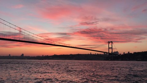 Sunset at July 15 Martyrs Bridge (Bosphorus Bridge) in Istanbul, Turkey.