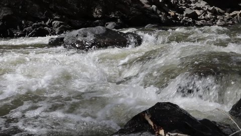 Fasting river rapids over rocks