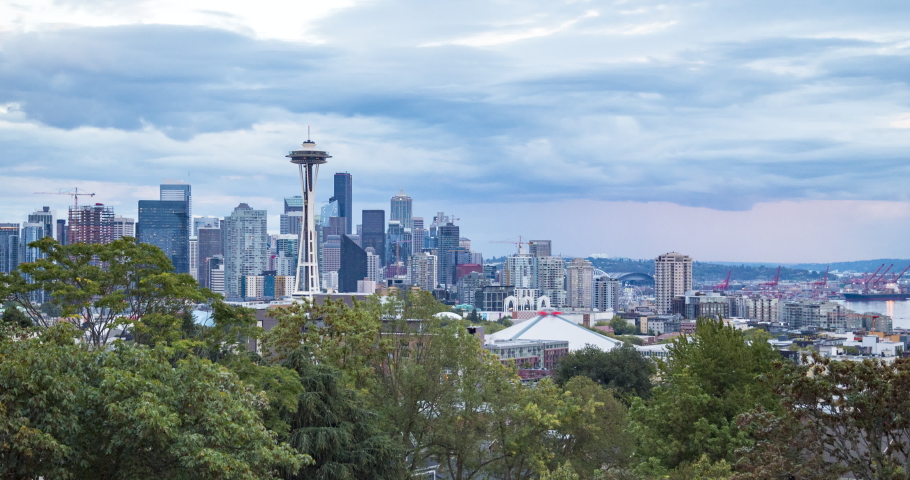 Seattle skyline view day to night time-lapse footage from famous Kerry Park panorama viewpoint on a beautiful day with fast moving clouds, Washington State, Pacific Northwest region, western USA