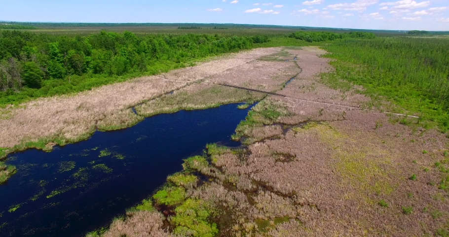 Beautiful Blue water marsh land from a drone view