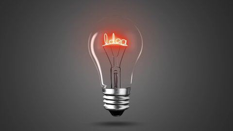 lighting bulb lamp with idea words on black dark background, 3D rendering animation, macro view