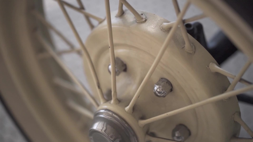 Close-up shot of a wheel of a vintage car of the years / decade of 1950., a Video by BlackBoxGuild