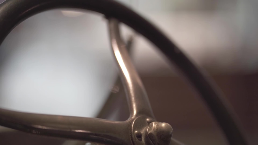 Close-up shot of a steering wheel of a vintage car of the years / decade of 1950., a Video by BlackBoxGuild