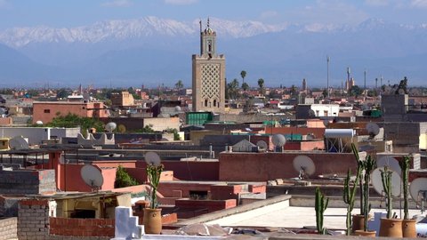 Marrakech panoramic landscape view with blue sky and mountains in the background. Still footage.