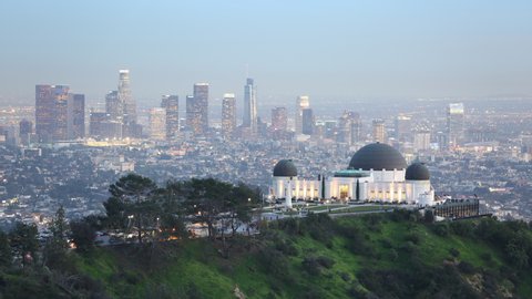 Time lapse at with view on Los Angeles downtown and Griffith Observatory from hills in Los Angeles california USA - may 2019