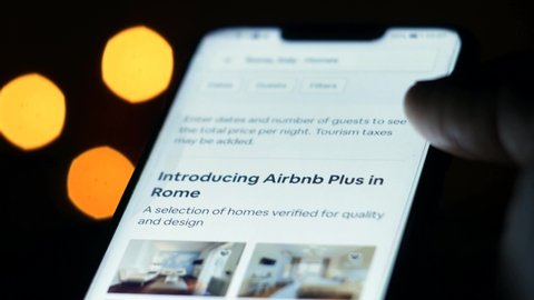 Sofia, Bulgaria, May 2019: Using Airbnb Mobile App; Looking for Home on Airbnb Application; Using The Airbnb App On Android To Find Vacation Lodge