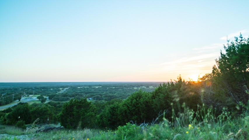 Time Lapse of Sunset Over The Texas Hill Country With Road in the distance