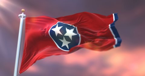 Flag of Tennessee state at sunset, region of the United States - loop