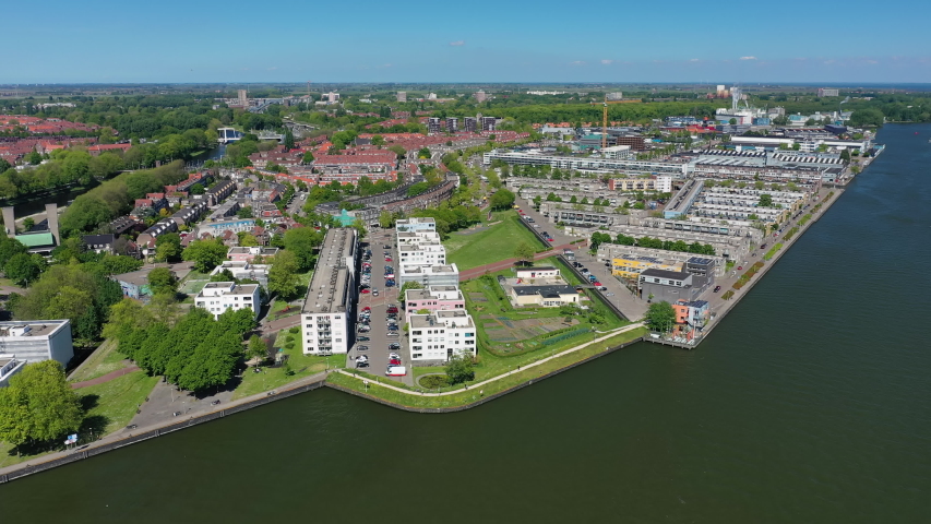 Aerial view of cityscape of Amsterdam, capital city of Netherlands, modern part of city - landscape panorama of Europe from above