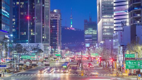 Seoul city and Skyscraper and Traffic at night intersection in yongsan, South Korea. 4K Timelapse
