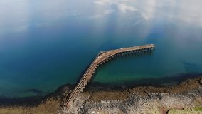 aerial clip of old pier at Hvítanes, Hvalfjördur, Iceland. Used in World War II by the British and American navies.