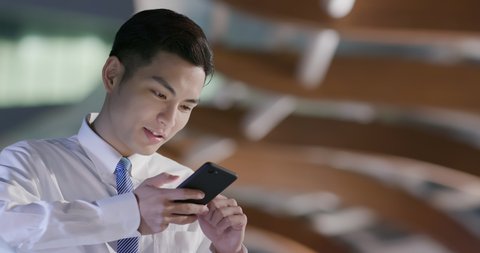 businessman use the smart phone and feel excited