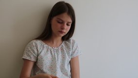 Teen girl is reading a book