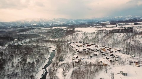 Aerial shot of snow village in winter, Niseko, Hokkaido, Japan