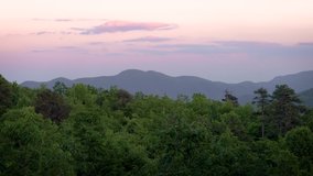 This is a 4k video of the mountains of North Carolina, USA showing a panning to the right effect as the light from the sun fades. It was taken from Buncombe County.