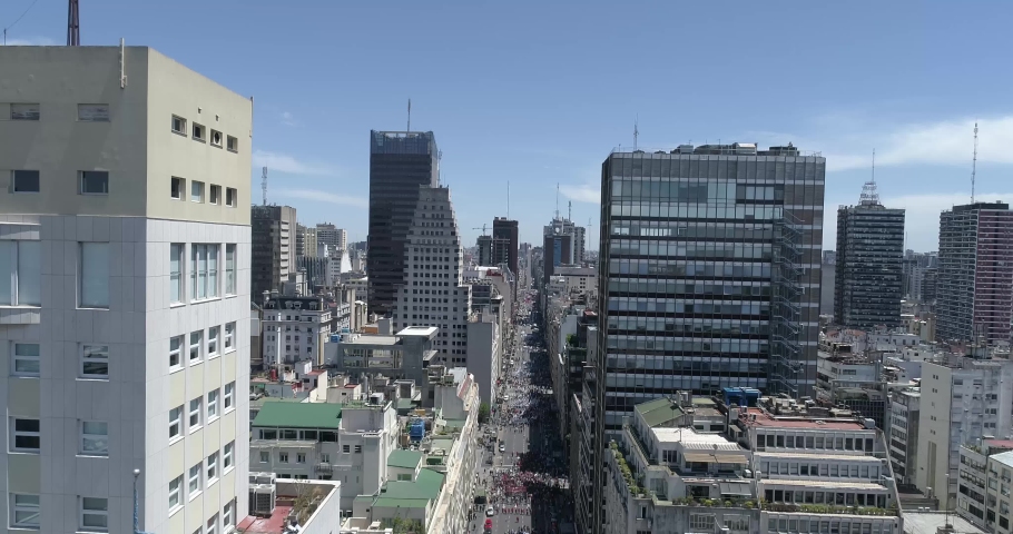 Corrientes Avenue with demonstrations in the center of the city in the Argentine capital. Buenos Aires - Argentina.