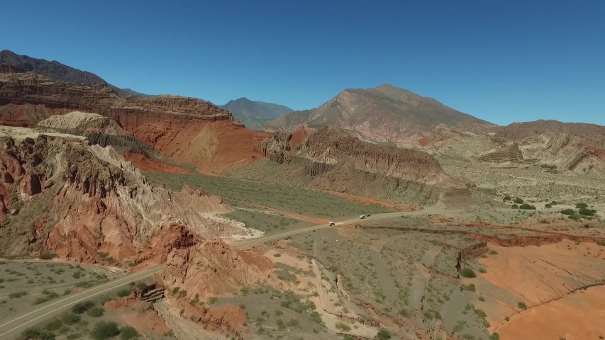 Aerial scene with drones. Camera forward on the edge of the mountains. Salta, Argentina