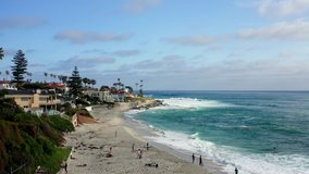 La Jolla, San Diego drone footage flying along the coastline by Marine St and Windansea Beach. 