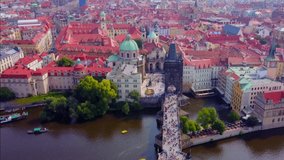 Aerial footage of Prague, Czech Republic, on a Beautiful summer’s day over the city, including Charles Bridge and Prague One municipal district 