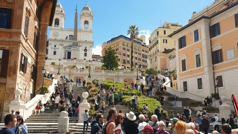 ROME. ITALY. May 21, 2019 Spain square on a bright Sunny day. Groups of tourists walk along the large staircase of the tourist area Piazza di Spagna