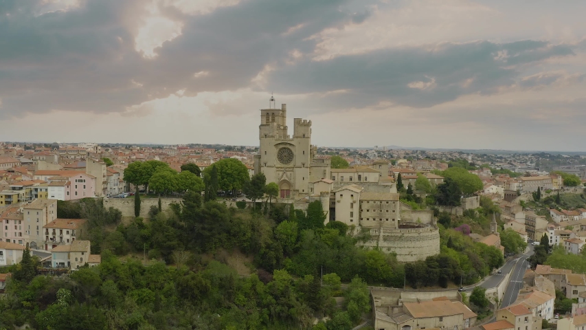 Smooth sunet in Bezier. Main spot is Saint Nazaire Cathedral with old town as background
