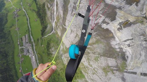 extreme paraglider pilot point of view