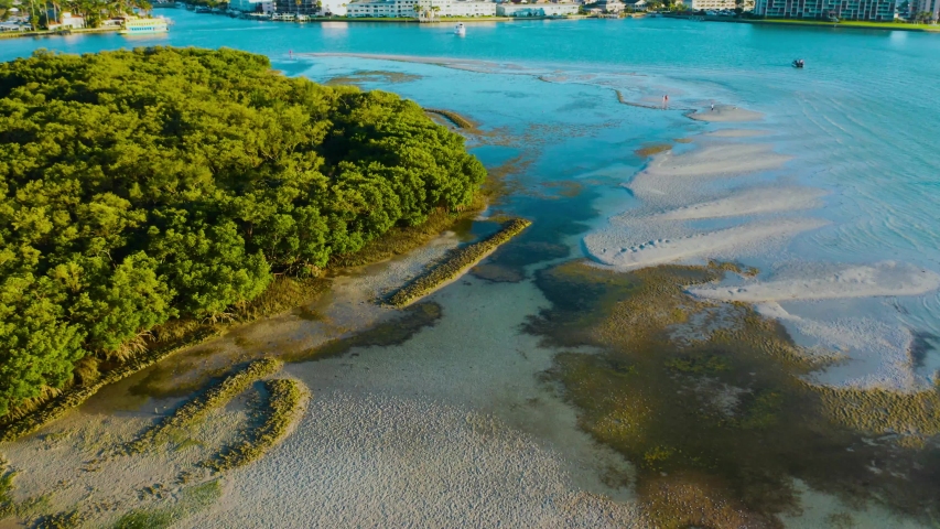 Aerial of hidden and remote tropical island in the inner coastal of Johns Pass in Florida.