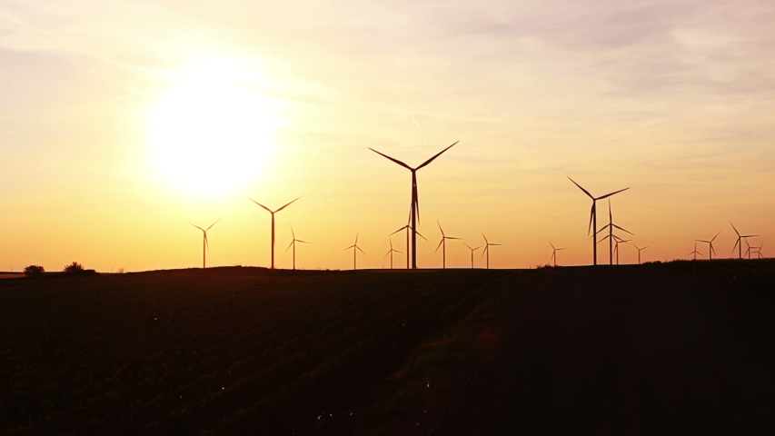 Wind Turbines Over Sunset Sky Generating  Electricity. Sustainable Energy Power Generators, Renewable Power Supply | Shutterstock HD Video #1030367969