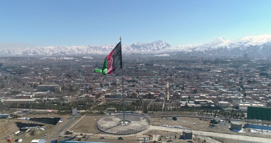 Afghanistan flag in the Kabul City Wazir Akbar Khan  Royalty-Free Stock Footage #1030368674