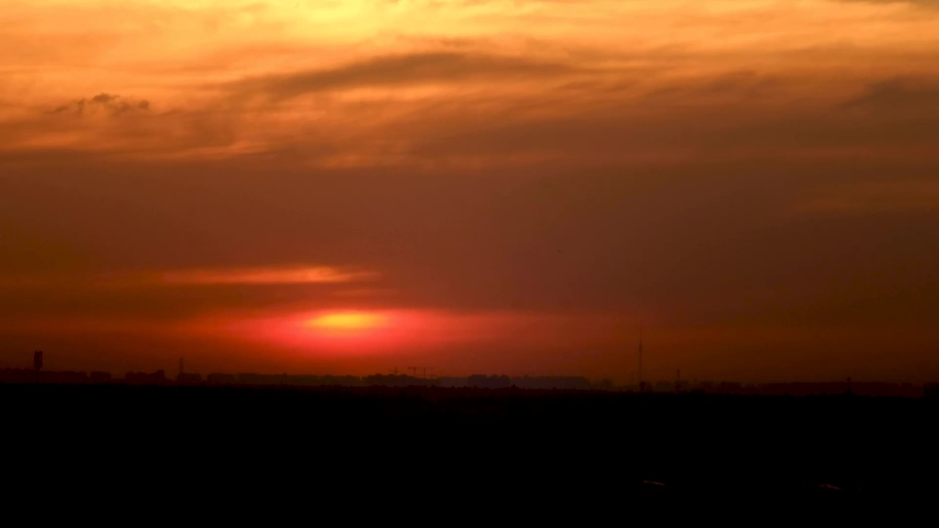 Time lapse sunset overlooking the Ostankino tower | Shutterstock HD Video #1030391411