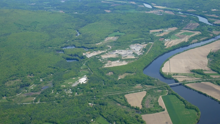 Connecticut River Valley AERIAL. 4,000 ft over the junction of MA, VT, NH borders, spring day.