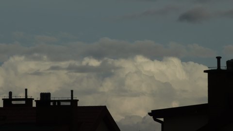 Clouds passing by - Over the roofs Time lapse -
