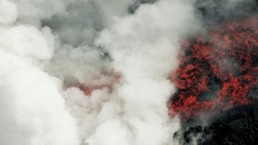 Aerial view hot steam clouds created from molten lava flowing into the Pacific ocean from a nearby erupting volcano toxic gases rising RED WEAPON - Powered by Shutterstock - Get 15% off with code: PIKWIZARD15