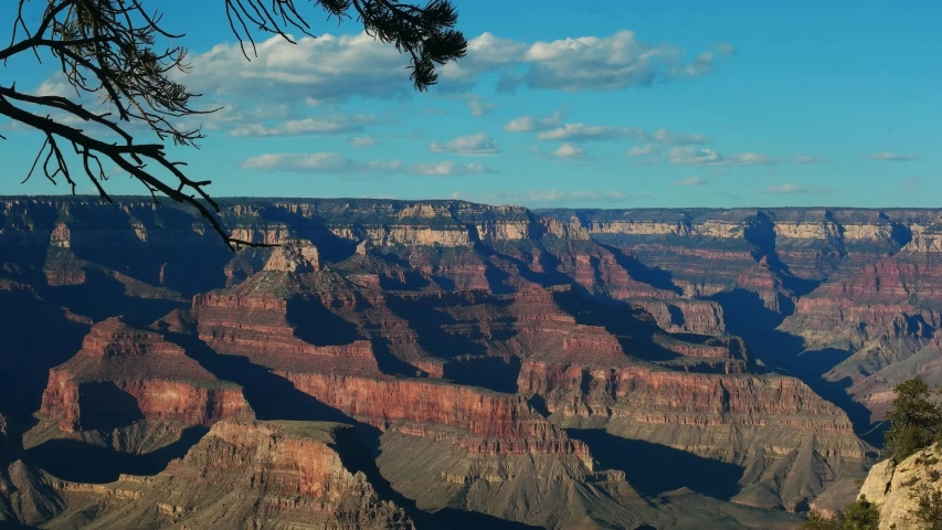 Grand Canyon Peaceful view with shadows sunlight and clouds passing by 4k video