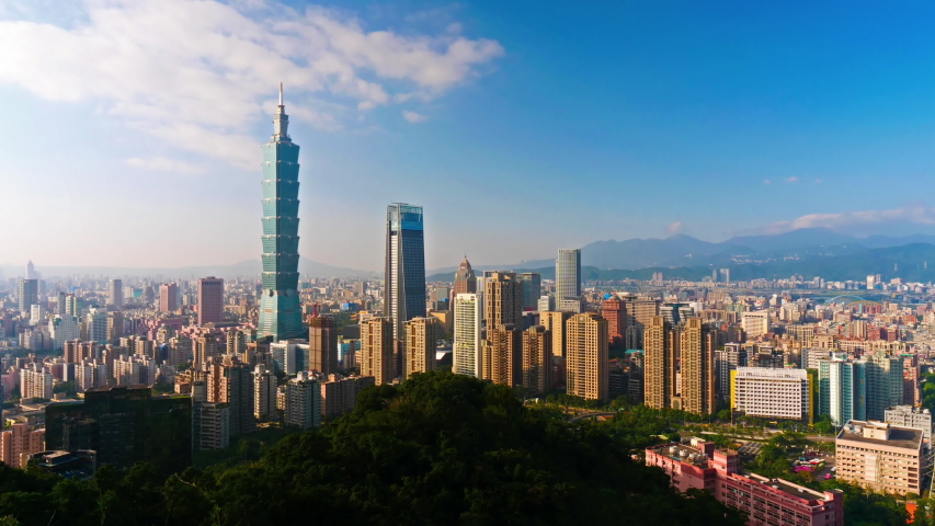 Static aerial time-lapse of the Taipei city skyline at daytime. - Taiwan