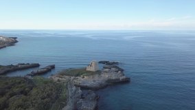 Drone pulling out a Sea Tower in Roca, Salento (Apulia)