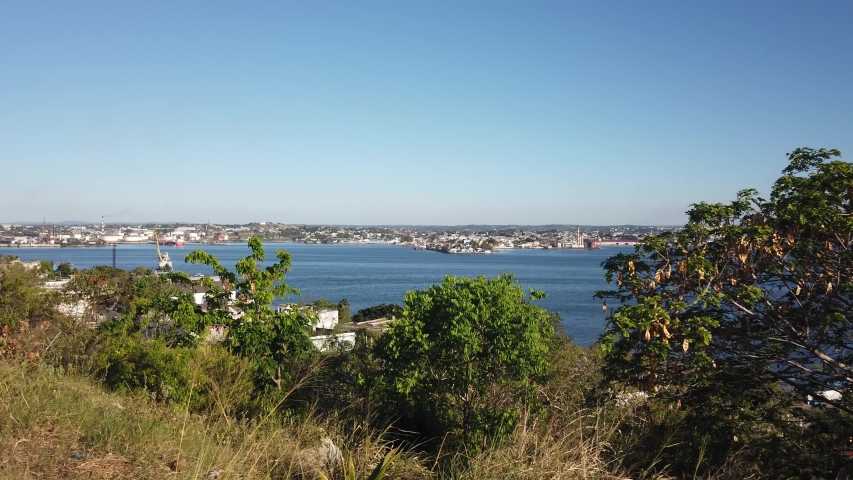 Caribbean sea and Malecon promenade. Aerial view of La Habana skyline, Cuban capital city. Urban landscape seen from the sky with old buildings and ocean