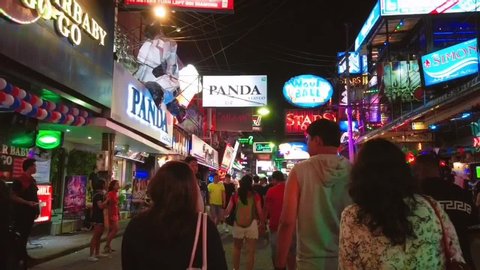 PATTAYA, THAILAND - MAY 25, 2019 : Crowd walking Street in Pattaya at night on red-light street. Walking Street area includes a go-go bars, nightclubs of Pattaya, Thailand.