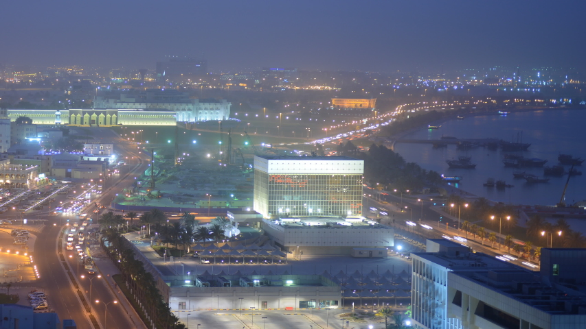 Timelapse Aerial View of Doha City Cars Traffic Jam on Busy Street Dusk to Night