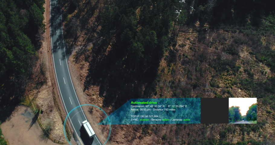 autonomous self Driving truck car driving on a forest highway with technology assistant tracking information, showing details. Visual effects clip Royalty-Free Stock Footage #1030467434