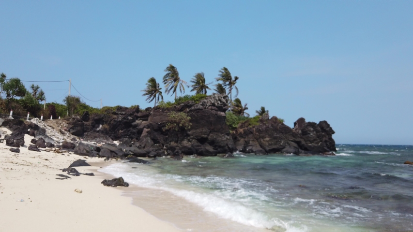 Be island ( small island, Bo Bai island ) with a ridge of jagged rock and beach  at Ly Son island, Quang Ngai Province, Viet Nam 