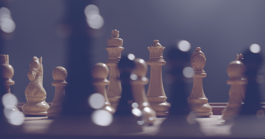 Strategy Concept of chess board game with lens flare. Royalty-Free Stock Footage #1030475927