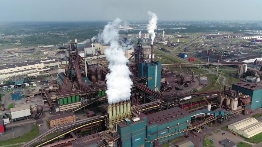 Aerial static view of steelmaking facilities blast furnace is a type of metallurgical oven used for smelting to produce industrial metals generally pig iron but also others such as lead or copper 4k