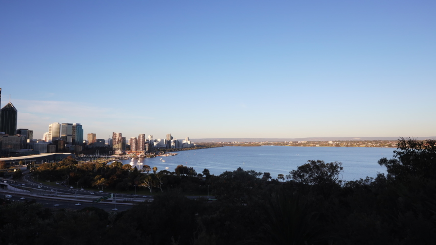 Beautiful stunning 4K time lapse footage  of Perth city CBD during the twilight sunsetting taking from King park botany garden, Australia   