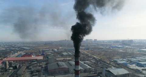 Top view of coal-fired power station Smoking smokestack Black smoke coming from chimney Environmental pollution 4K aerial