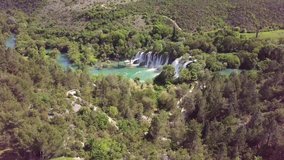 Slow rising aerial drone footage of Krka National Park waterfall in Croatia