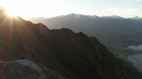 4K Aerial of photographer on top of Roys Peak Wanaka New Zealand