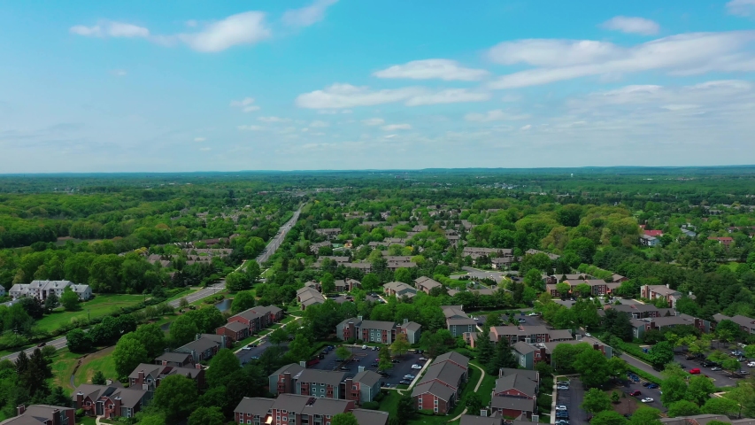 Fast flying over houses in the outskirts of New Jersey, showing the suburban lifestyle.