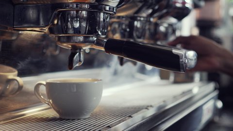 Coffee machine making espresso in a cafe